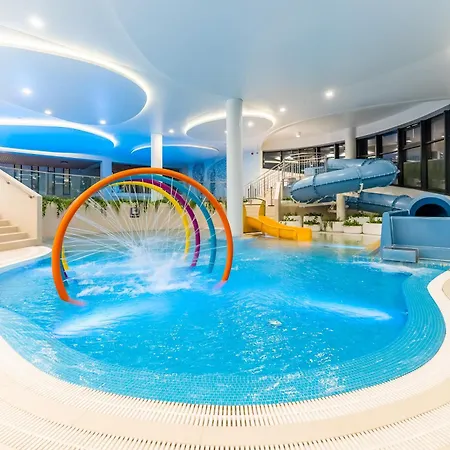 Апартаменты Polanki Aqua 3-pokojowy -premium- Family - Baseny, Wellness I Blisko Morza Garage & Pool Access Колобжег